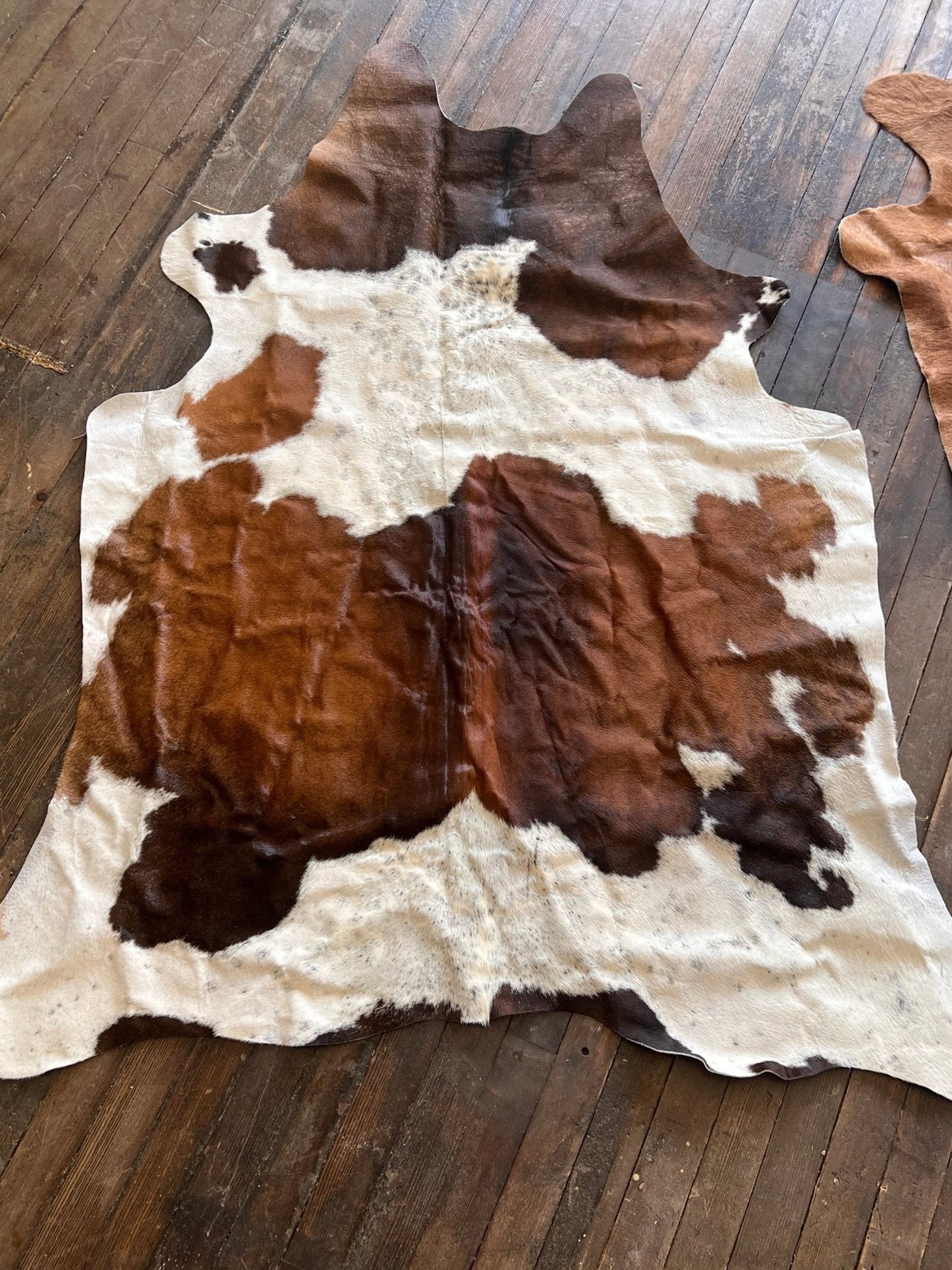 Cowhide Rug - 6.5 ft by 4.5 ft.