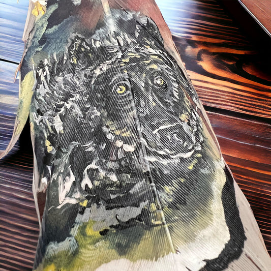 Painted hat feather by Chad Demien