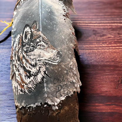 Painted hat feather by Chad Demien - Wolf