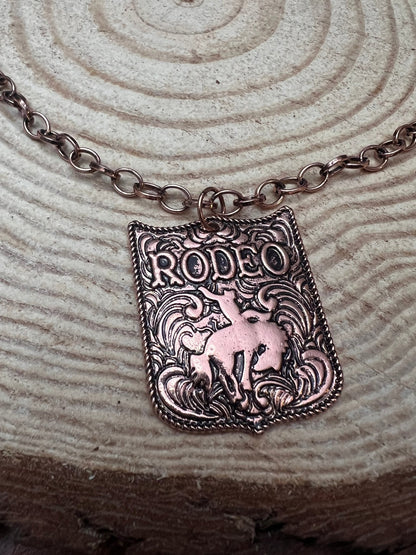 Rustic Brass Colored Rodeo Pendant Necklace – 22" Western Cowgirl Statement Jewelry